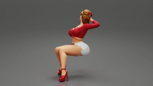 Figure of a Women in shorts sitting 137  100mm high  Scale 1:18