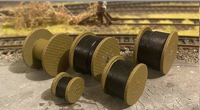 2 cable drums without cable showing . 2 cable drum with cable 4 sets of support for drums .G Gauge Scale 1.24