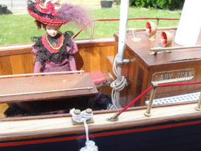 A Model boat Steering Wheel  (22mm high) + 2 Handrails