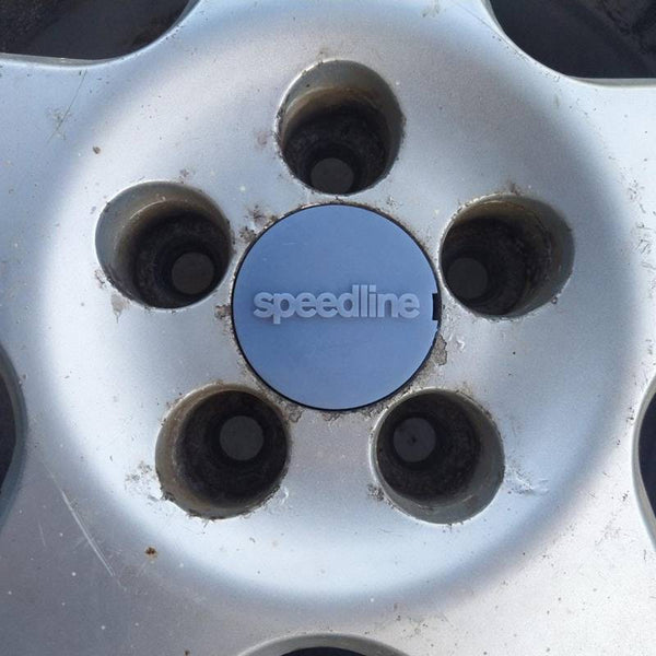 A set of 4 centre caps for VW Corrado VR6 in the style of Speedline