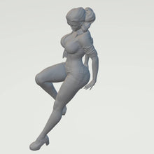 Model figure of a  Women sitting down  in Shorts 141  100mm high scale 1:18